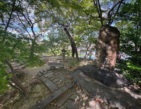 A memorial stone at the Kiyosu Castle site under trees